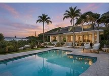 Coastal luxury home at sunset